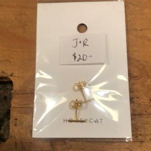 Gold post earrings with jeweled accents